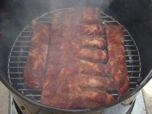 1 slab of ribs plus trimmings on the bottom cooking grate