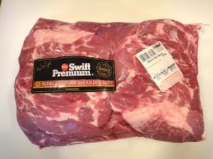 Two boneless pork butts in Cryovac packaging