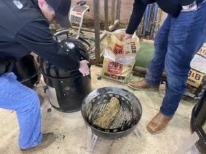 Placing a split oak log into the WSM charcoal chamber instead of wood chunks