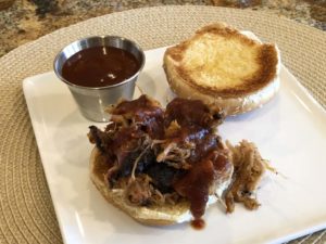 Pulled pork sandwich with sauce